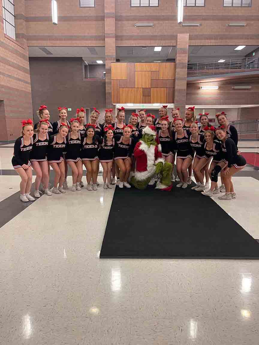 Grinch with HHS Cheerleaders